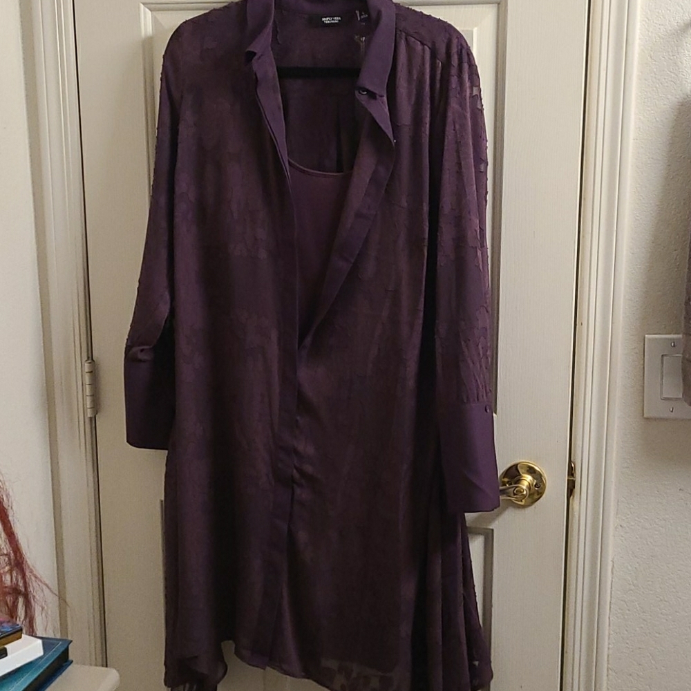 Never worn 2-piece dress. Price tag still attached. I changed my mind about it.